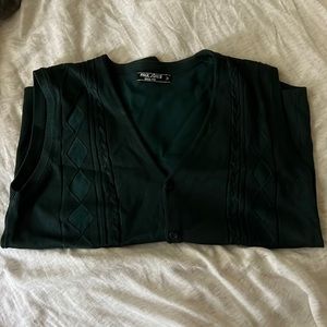 Green sweater vest